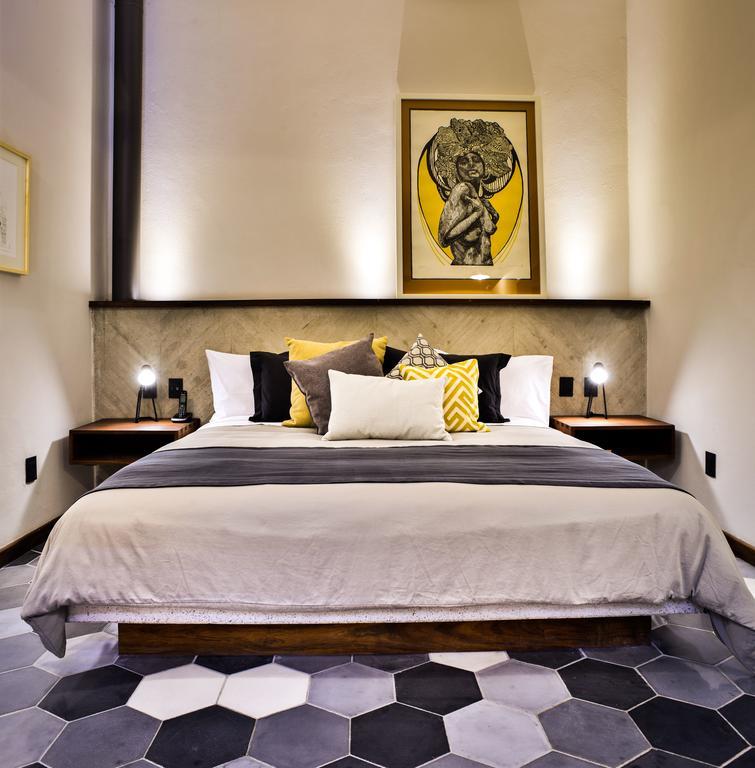 Hotel Criol Querétaro Eksteriør bilde A bedroom at the hotel